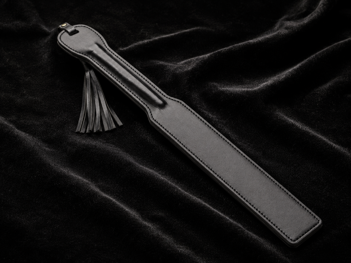 Tassel Paddle — Smooth Black Leather with Fringe Detail