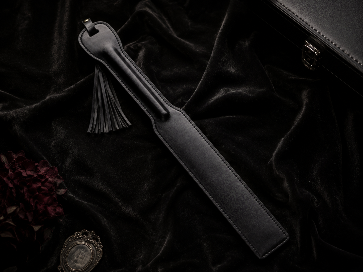Tassel Paddle — Smooth Black Leather with Fringe Detail