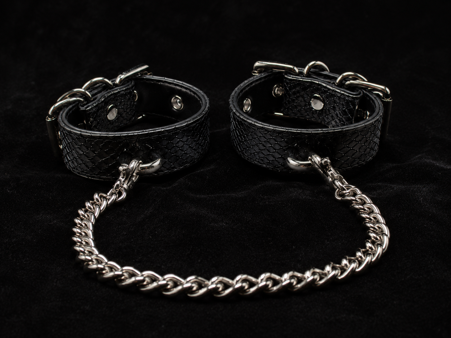 Chain Cuffs — Black Snake-Embossed Leather with Silver Curb Chain